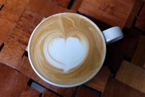 Coffee latte art in coffee shop 11042057 Stock Photo at Vecteezy