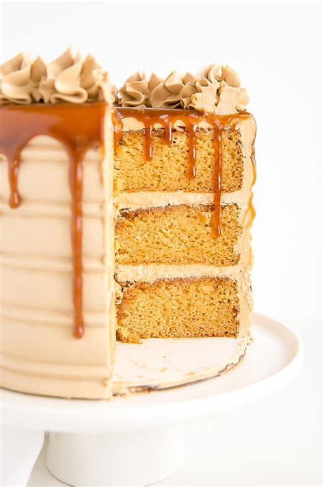 Cross section of a caramel cake with caramel dripping down. | Salted ...