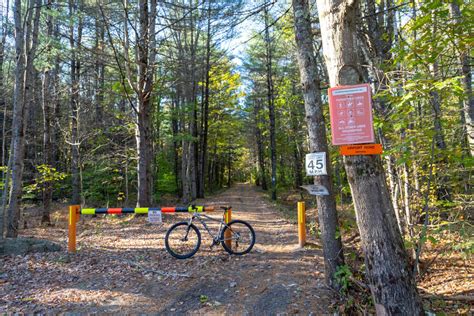 Biking on the Hillsborough Recreational Trail - NH State Parks