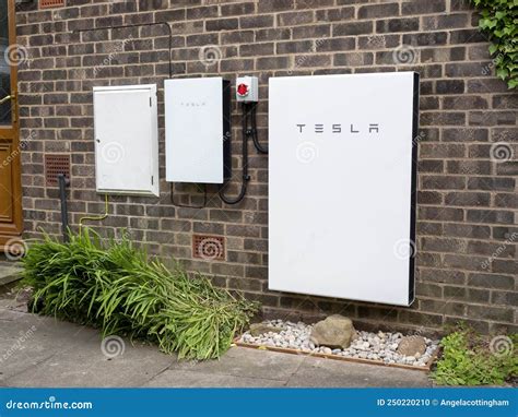 Tesla Powerwall 2 and Backup Gateway 2 on a House Wall Editorial Image ...