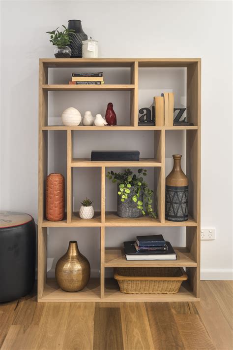 Showcase your knick knacks perfectly in a contemporary timber bookcase ...