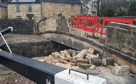 Vehicle partially demolishes Bradford on Avon canal bridge in evening crash