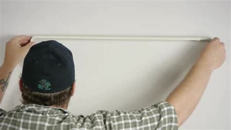 Video: How to Hang Curtain Rods on Drywall | eHow