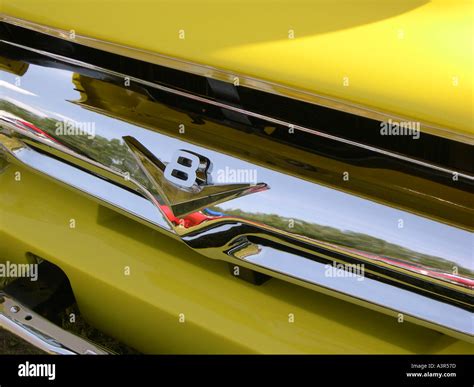 Grill of american classic truck with v8 emblem Stock Photo - Alamy