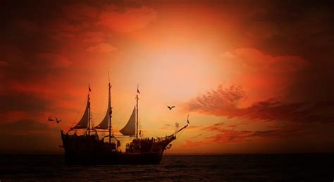 Painting of a sailing ship at sunset free image download