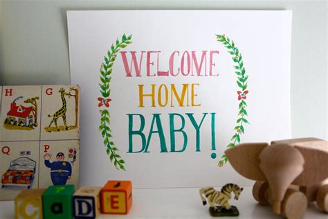 hand-painted welcome home baby sign