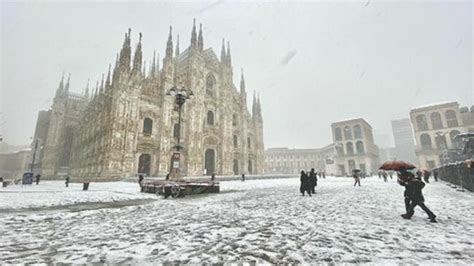 Snow Falls Over Milan Cathedral as Winter Weather Causes Disruption