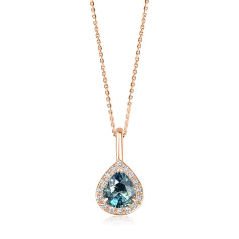 Teal Sapphire and Diamond Halo Pendant | Pravins