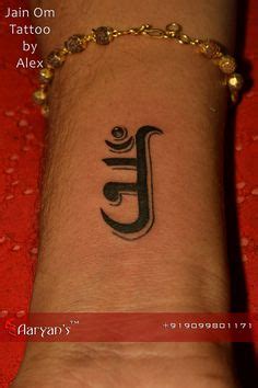 Black Jain Om Symbol Tattoo Design For Wrist By Alex