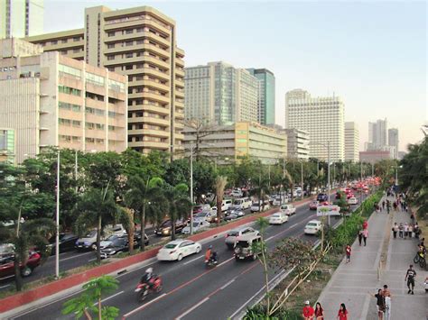 Roxas Boulevard runs along Manila Bay south of downtown Manila, the ...