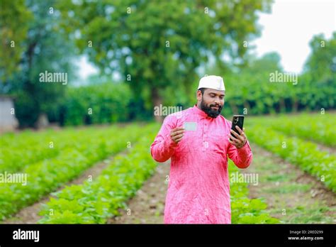 Indian farmer Holding ATM card in hands , happy indian farmer, poor ...