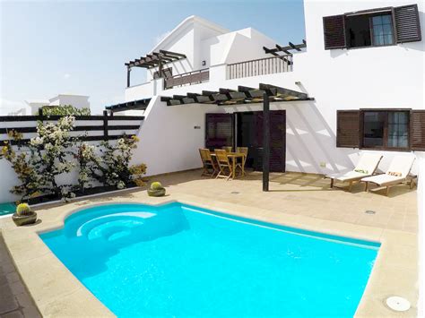 Villa in Playa Blanca with Sea Views and South Facing Private Pool ...