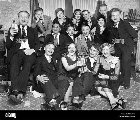 Young people drink bootleg whiskey labled “Old Log Cabin” during ...