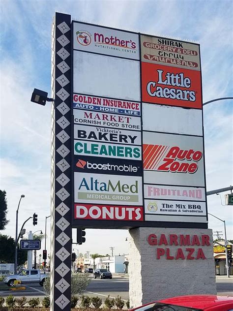 Plaza Tenant Sign Restoration - Dave's Signs