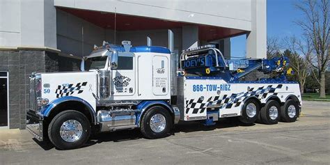 Powerful Peterbilt 389 Twin Steer Tow Truck in Detroit