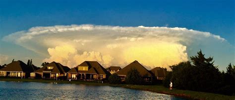 This nuclear explosion-looking cloud formation over some houses in my ...