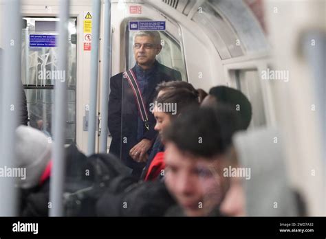 London Mayor Sadiq Khan travels on a Jubilee Line tube train to Bond ...