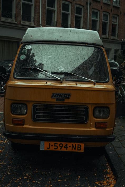 Vintage Yellow Bus on a Street · Free Stock Photo