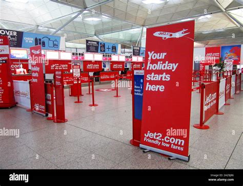 Jet2.com airline check in desk seen at London Stansted Airport Stock ...