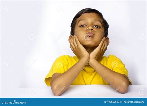 Indian Kid with Facial Expression Stock Image - Image of pride, desk ...