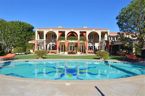 Discover a lush mansion in Beverly Hills. Gorgeous grounds include a ...