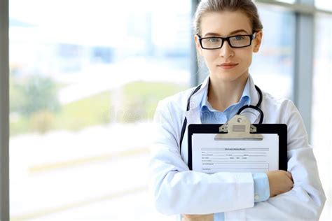 Medical Physician Doctor Woman Over Blue Clinic Background Stock Photo ...