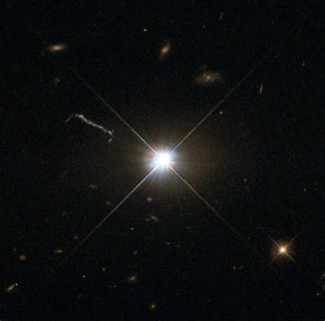 NASA's Hubble Gets the Best Image of Bright Quasar 3C 273 - NASA Science