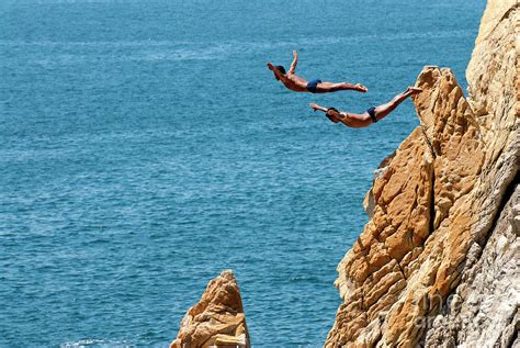 Famous cliff diver of Acapulco Mexico Photograph by Anthony Totah - Pixels