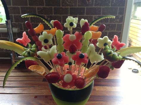 Fruit centerpiece | Edible art, Fruit centerpieces, Fruit art