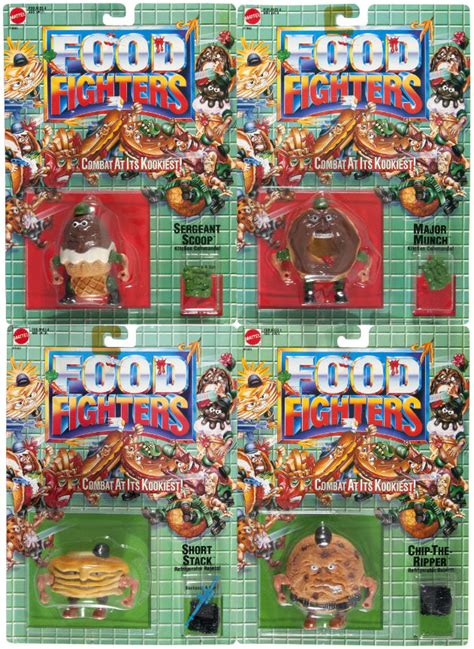 Hake's - MATTEL FOOD FIGHTERS SET OF TEN FIGURES ON CARDS AND TWO VEHICLES.