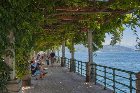 Arona Lakeside Promenade with Strolling Tourists. Province of Piedmont ...