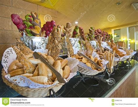 Photo about Bread selections on display at a hotel buffet. Image of ...