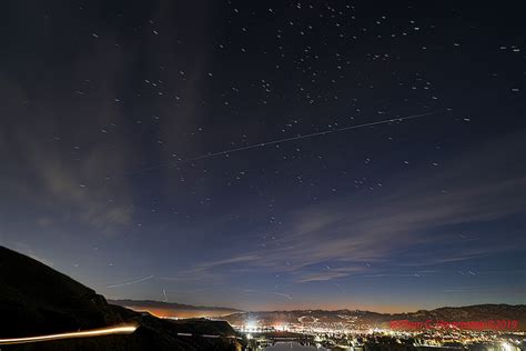 Starlink ‘train’ traces path across twilight skies – Spaceflight Now