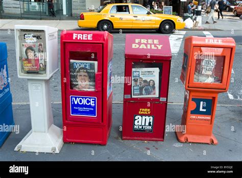 Free newspaper boxes on the street, New York City, USA Stock Photo - Alamy