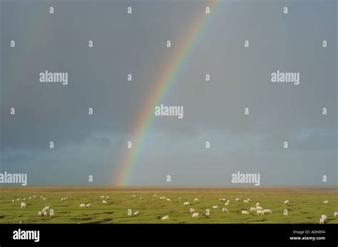 rainbow storm clouds Stock Photo - Alamy