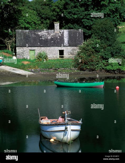 derrynane, iveragh peninsula, county ring of kerry, boats reflected in ...