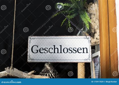 Closed sign in a shop door stock image. Image of load - 175917029