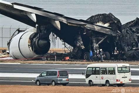 羽田衝突事故、「模範的」避難に称賛 写真18枚 国際ニュース：AFPBB News