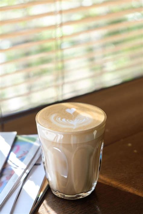 Coffee latte art in coffee shop 11044588 Stock Photo at Vecteezy