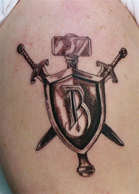 25 Powerful Shield Tattoo Designs | Shield tattoo, Tattoo designs, Tattoos