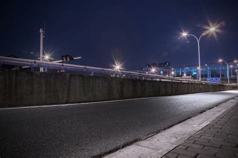 Free Photo | Road with illuminated streetlights