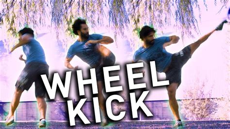 The Spinning Hook Kick (Wheel Kick) TUTORIAL - YouTube