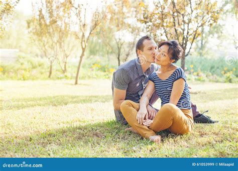 Happy mixed race couple stock image. Image of autumn - 61053999