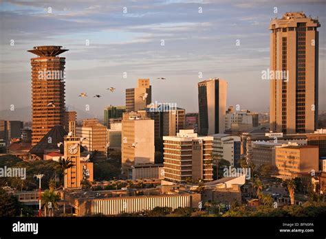 Kenya, Nairobi. Nairobi skyline bathed in late afternoon sunlight as a ...