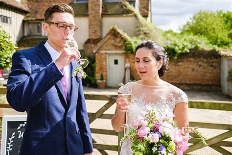 English country barn wedding with cottage garden flowers