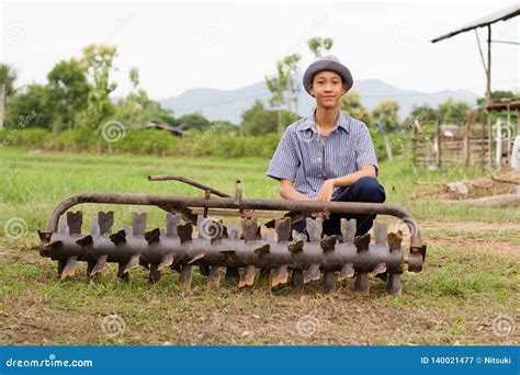 Farmer Repair Tractor Rotary at Farm Stock Image - Image of agronomist ...