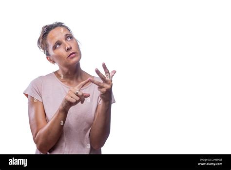 pensive woman counting on her fingers on a white background Stock Photo ...