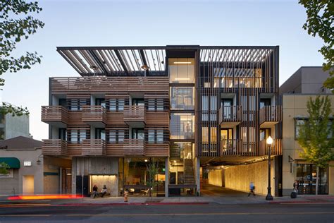 This Small Hotel Has A Facade Screened With Redwood For Sun Shading