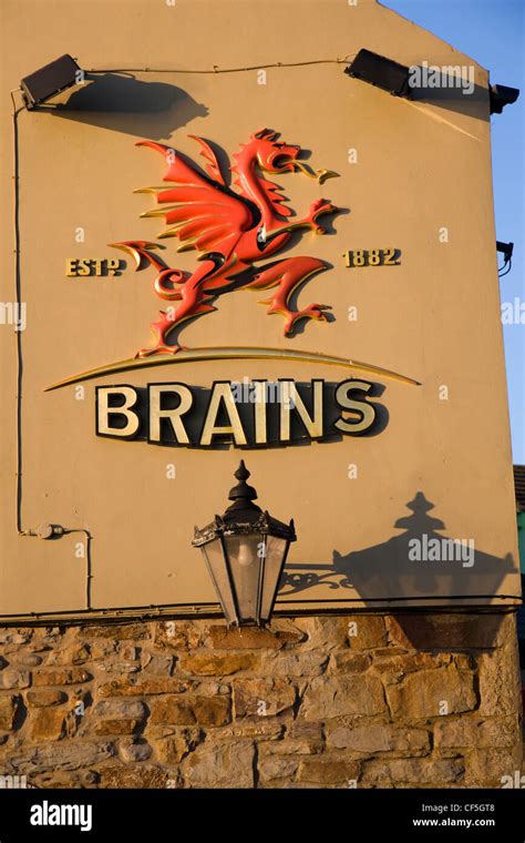 Logo of Brains Brewery, the red Welsh dragon, on the wall of a pub in ...