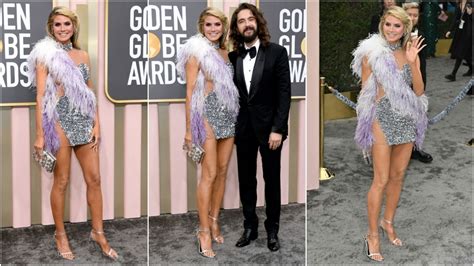 Heidi Klum risks it all in barely-there silver cut-out mini dress ...